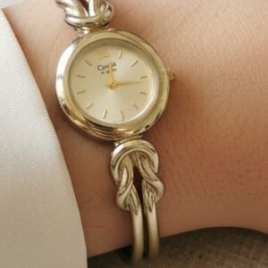 Caravelle By Bulova Women's Gold and Silver Watch